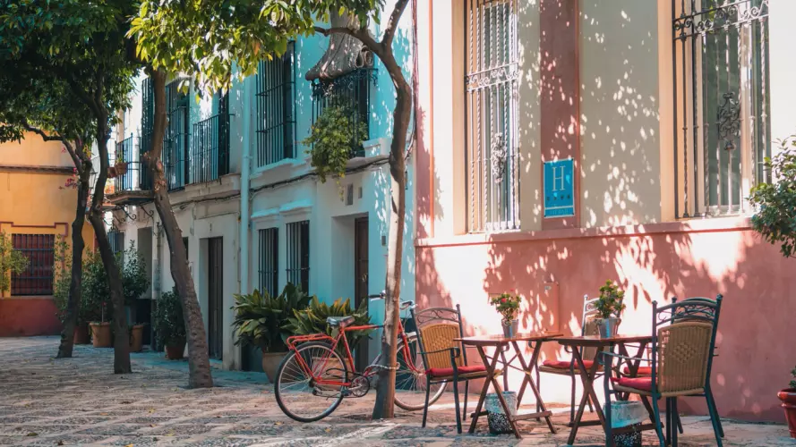 Empty street with cafe tables
