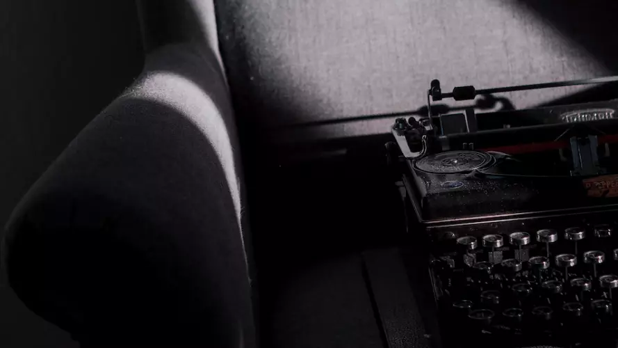 Typewriter on wing chair