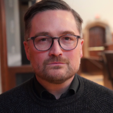 Headshot of Rhodri Lewis