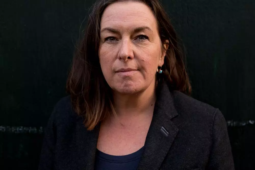 Headshot of Visiting Scholar Una